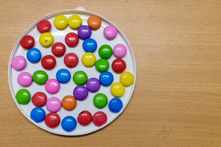 Handful Of Colorful Tasty Chocolatesの写真素材