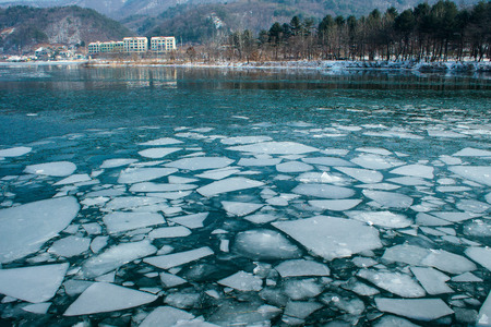 Breaking ice float at the river.の写真素材