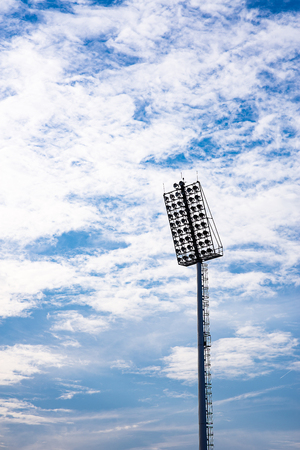 stadium lights with blue sky backgroundの写真素材