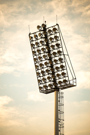 Close up of stadium lights in warm toneの写真素材