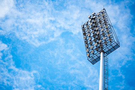 Close up of stadium lights with blue sky backgroundの写真素材