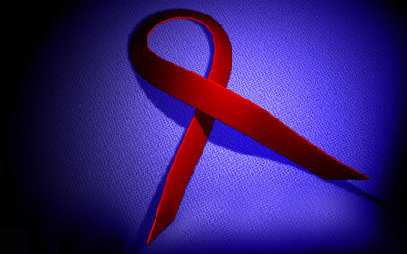 Digital illustration of a HIV ribbon in colour background	