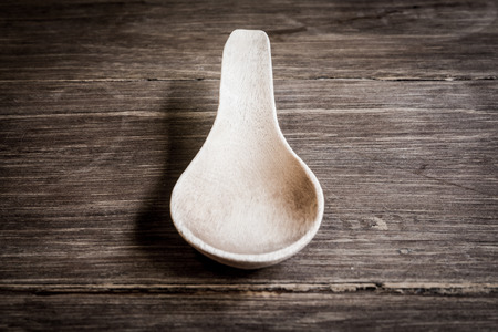 Wooden spoon on wood Tableの写真素材