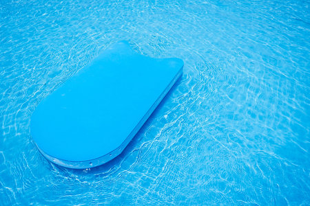 pool kick board in swimming pool