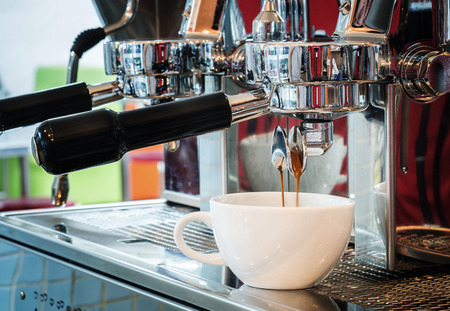 prepares espresso in coffee shopの写真素材