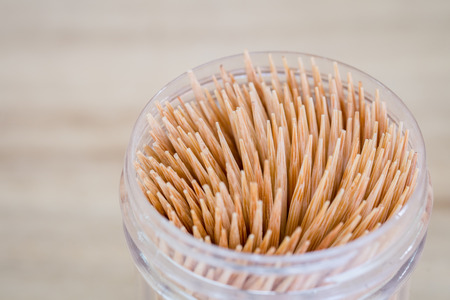 Abstract wooden toothpicks on wood backgroundの写真素材
