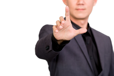 Businessman pointing or touching on white backgroundの写真素材