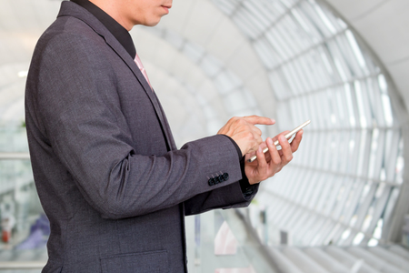 Businessman using mobile smart phoneの写真素材
