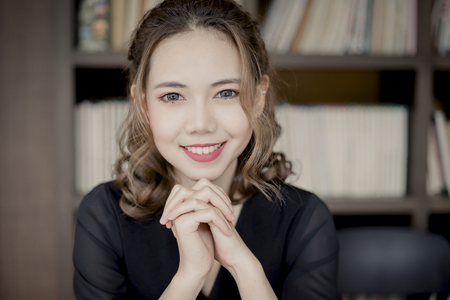 Beautiful Smiling Young Asian Woman. Portrait of cute girl with clean, fresh and perfect skin.の写真素材