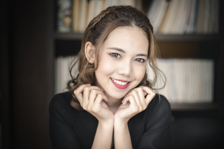 Beautiful Smiling Young Asian Woman. Portrait of cute girl with clean, fresh and perfect skin.の写真素材