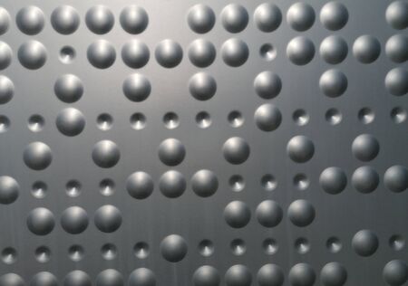 Abstract metal bubbles up close background textureの写真素材