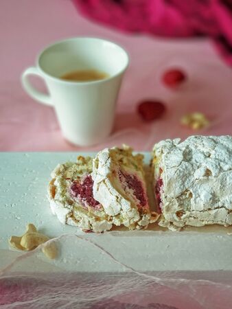 Romantic Breakfast with a raspberry nut cake, cup of freshly brewed coffee and raspberries. Easy healthy sweet snack girl. The concept of Valentine's day. Food photos, top view, copy spaceの写真素材