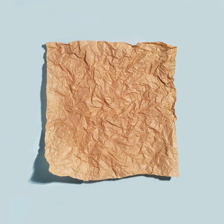 Crumpled blank sheet of brown wrapping kraft paper, vintage texture for the designer