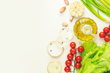 Organic vegetables and olive on a white background