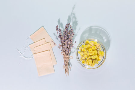 Bouquet of lavender flowers, dry tansy flowers and paper tea bags