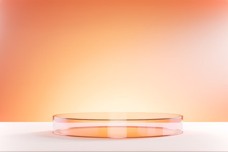 Empty round glass podium for montage your product and presentation on tender peach fuzz color background. Show case for natural cosmetic products. Concept scene stage for new product, promotion saleの素材