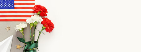 Holiday banner with carnations, American flag, paper plane and place for text. Banner suitable for National Aviation Day in USA, celebrated in August and U.S. Air Force Birthday, September 18の写真素材