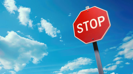 red stop traffic sign on blue sky backgroundの素材