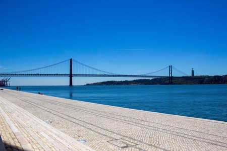 The 25 April Bridge over the Tagus River, Lisbon, Portugalの写真素材