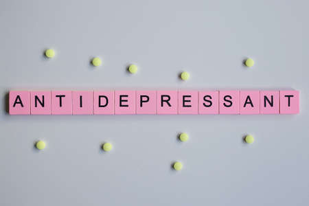 Antidepressant word wooden cubes on a white backgroundの写真素材