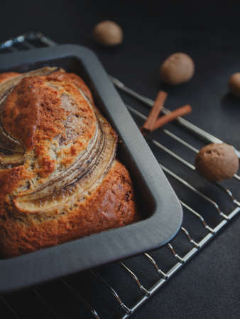Homemade banana bread with cinnamon and walnuts.の写真素材