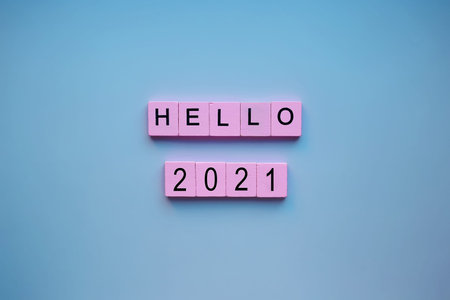 Hello 2021 word wooden cubes. New year.