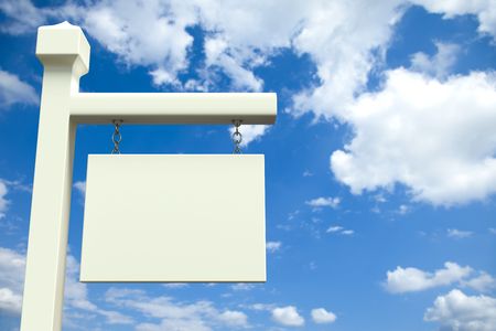 White blank board in front of a cloudy skyの写真素材