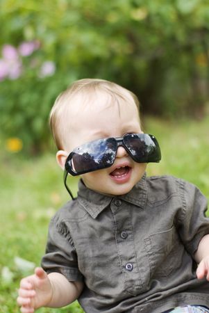 boy with sunglasses outdoorsの写真素材