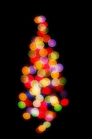 Abstract Christmas tree - Christmas lights on a Christmas tree out of focus. の写真素材