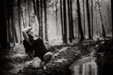 Fantasy image with a fallen angelの写真素材
