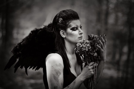 Fantasy image with a fallen angel