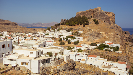 A greek village near a mountain at Rhodes, Greeceの写真素材