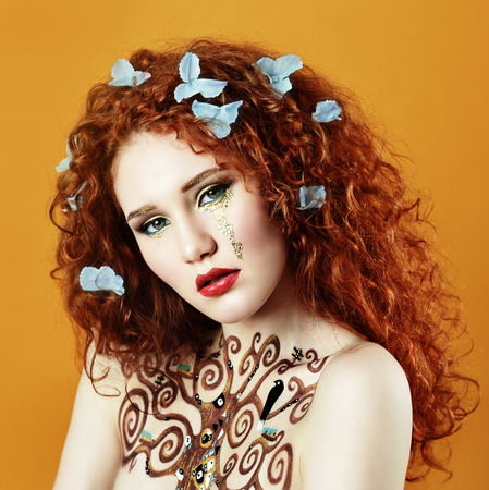 the girl with red hair posing in Studioの写真素材