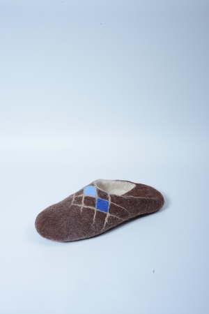 felted shoes on white backgroundの写真素材