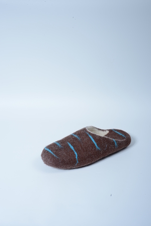 felted shoes on white backgroundの写真素材