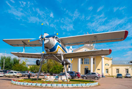 Ulan-Ude, Russia - August 3, 2018: view of An-2 plane in front of the old building of the Baikal airport.のeditorial素材