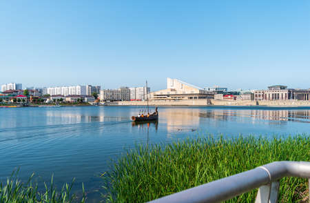 Kazan, Russia - August 5, 2020: Kaban lake embankment overlooking the city and the Tatar State Academic Theater.のeditorial素材