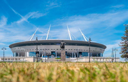 Saint Petersburg, Russia - June 19, 2019: View of Gazprom Arena with Kirov Monument in front of it. Krestovsky Stadium will host for the 2020 UEFA European Football Championship matches.のeditorial素材