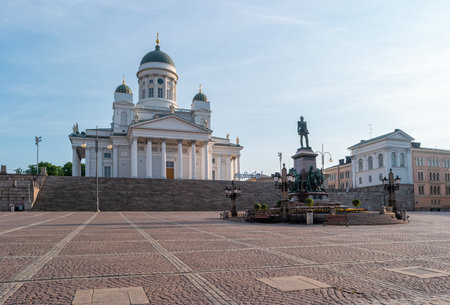 Helsinki, Finland - June 21, 2019: Monument of Alexander II and Helsinki Cathedral in the early morning. View of the Senate square.のeditorial素材