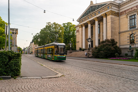 Helsinki, Finland - June 21, 2019: Tram passes The House of the Estates. One of the central streets of the Finnish capital.のeditorial素材