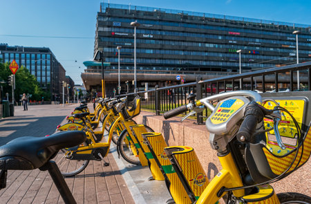 Helsinki, Finland - June 21, 2019: Bicycle parking for Alepa Fillari rental bikes near Helsinki Central Station.のeditorial素材