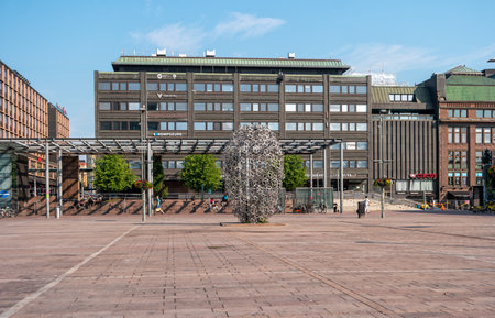 Helsinki, Finland - June 21, 2019: Entrepreneurs monument on Plaza Narinkka. Modern architecture in the center of the Finnish capital.のeditorial素材