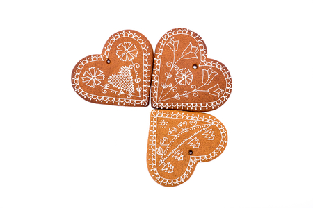 Home-baked and decorated gingerbread on white background.の写真素材