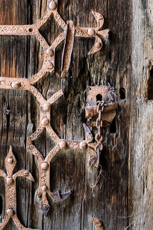 Old wooden door with gothic architecture detail. Door Detail for Backgrounds.の写真素材