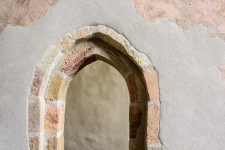 Old stone door with gothic architecture detail. Door Detail for Backgrounds.の写真素材