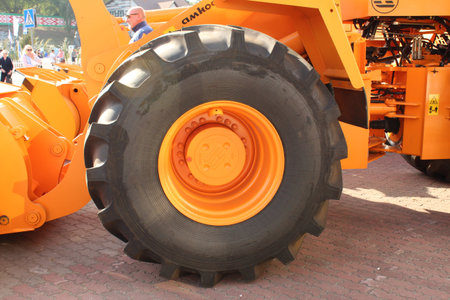 the mechanism of the tractor yellow silver metal color agriculture processing