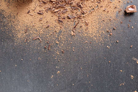 cocoa on gray stone black background fantasy background brown gray black.の写真素材