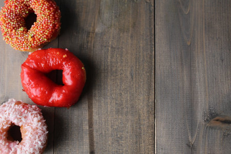 Donuts on a gray background. Banner advertising background with space for copyspace text.の写真素材