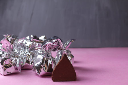 Candy in a cut in a silver wrapper. Handmade Candy Concept.の写真素材