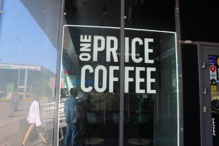 St. Petersburg, Russia, August 01 2025: One Price Coffee sign coffee